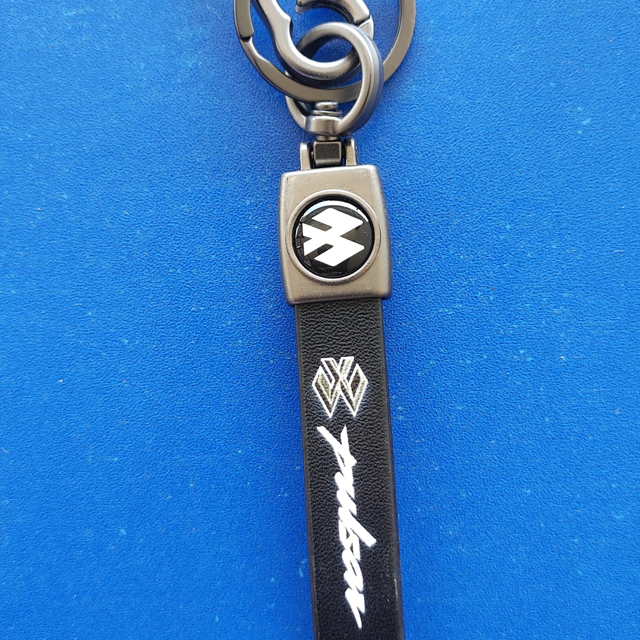 24 Pulsar Logo Keychain| Pulsar Logo Steel and Leather Keychain for Car and bikes